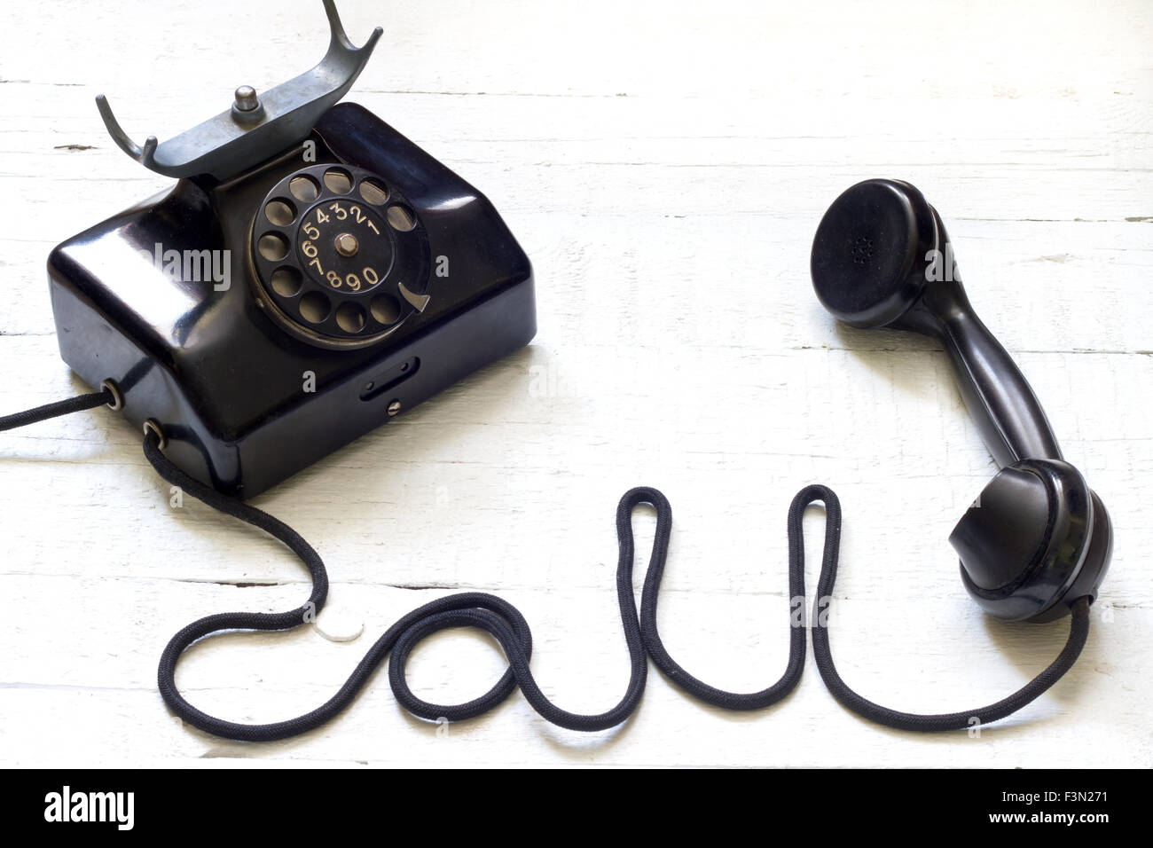 Old vintage telephone with call sign letters abstract concept Stock Photo