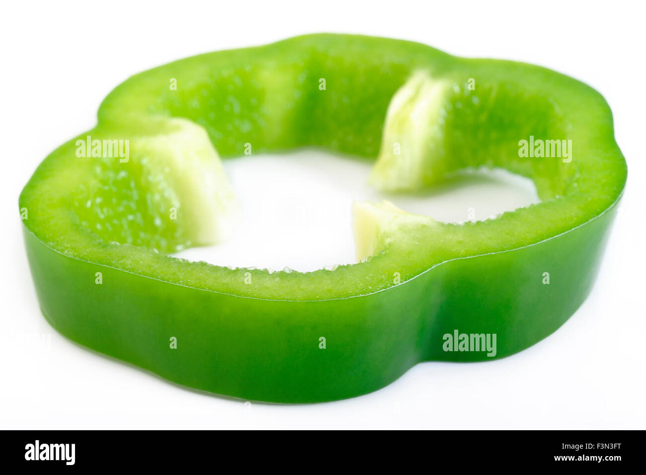 Sliced green pepper isolated on white background Stock Photo - Alamy