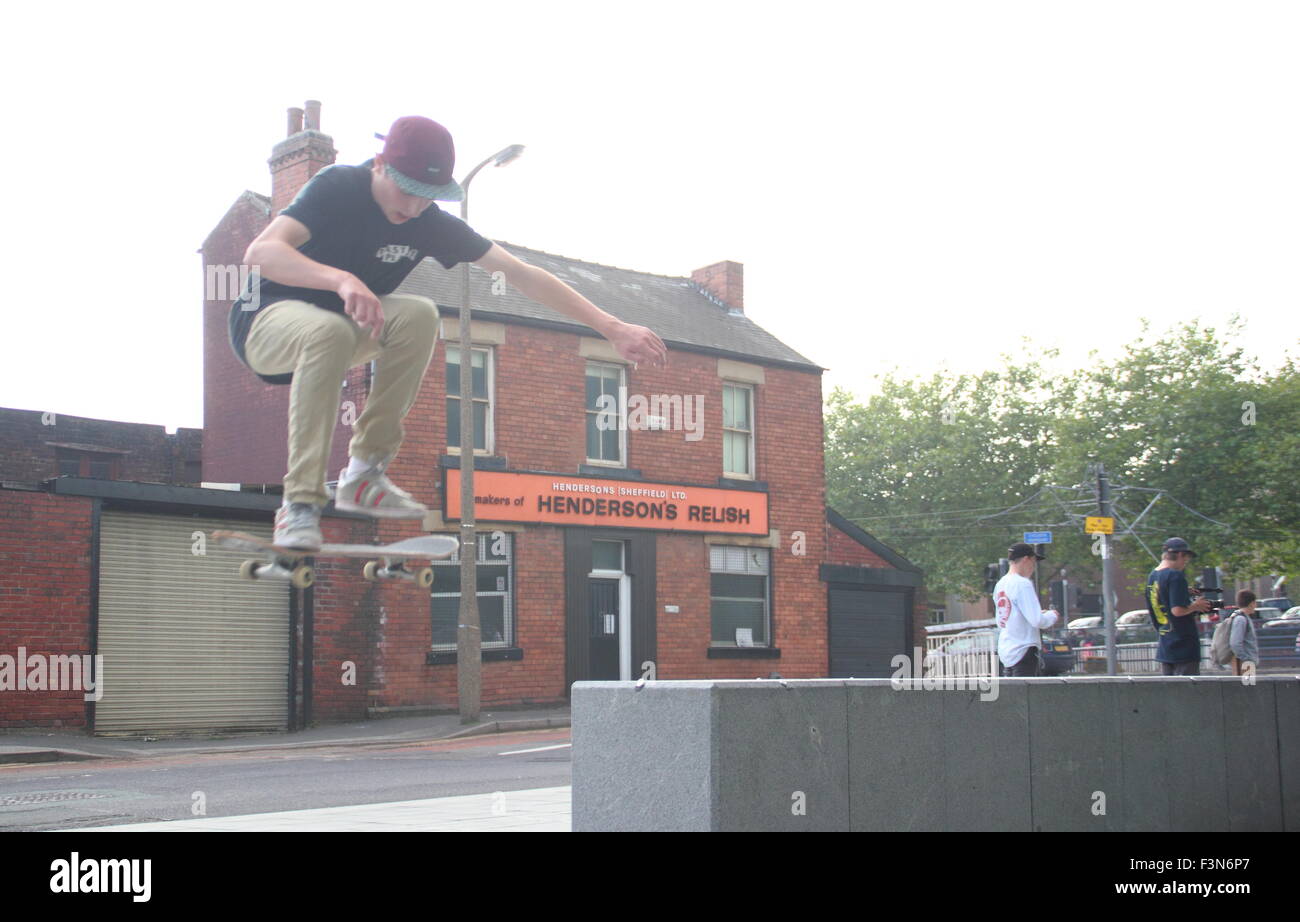 A skateboarder by the Henderson's Relish building on Leavygreave Road, Sheffield, Yorkshire England UK - October 2015 Stock Photo