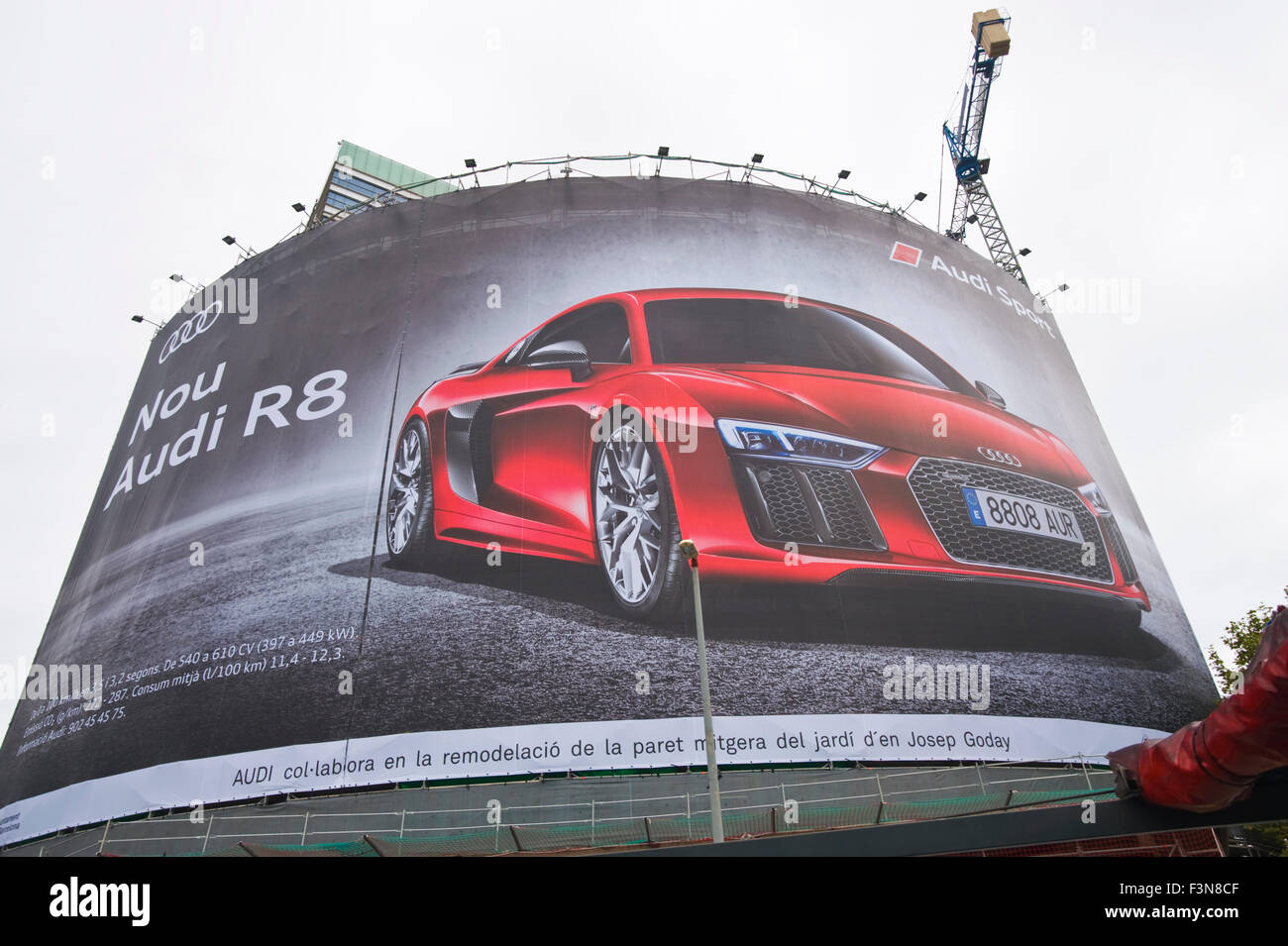 Giant billboard on front of building advertising Audi R8 motorcar in Barcelona Catalonia Spain ES Stock Photo