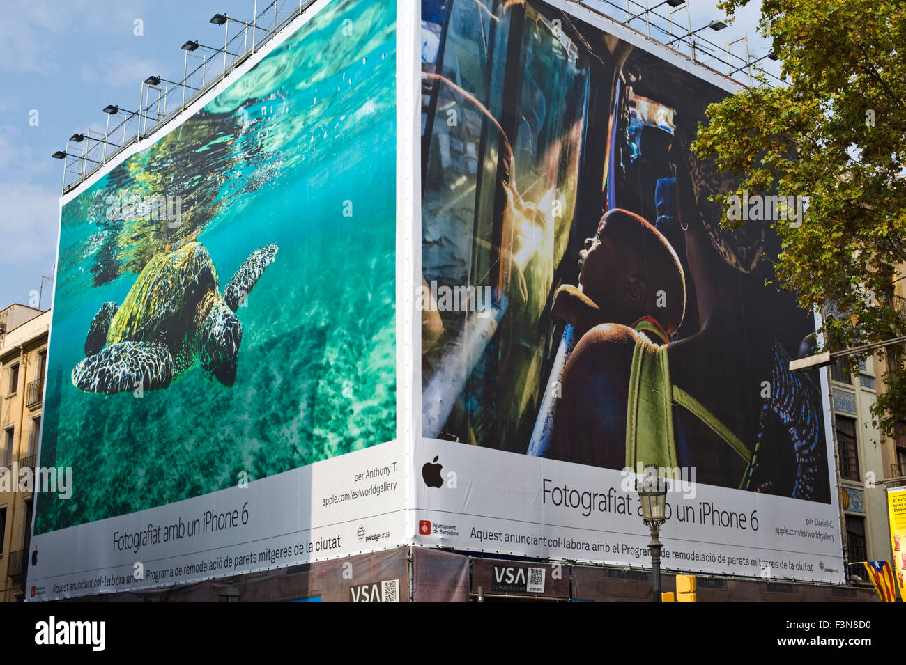 Giant billboard on front of building advertising iPhone 6 in Barcelona Catalonia Spain ES Stock Photo