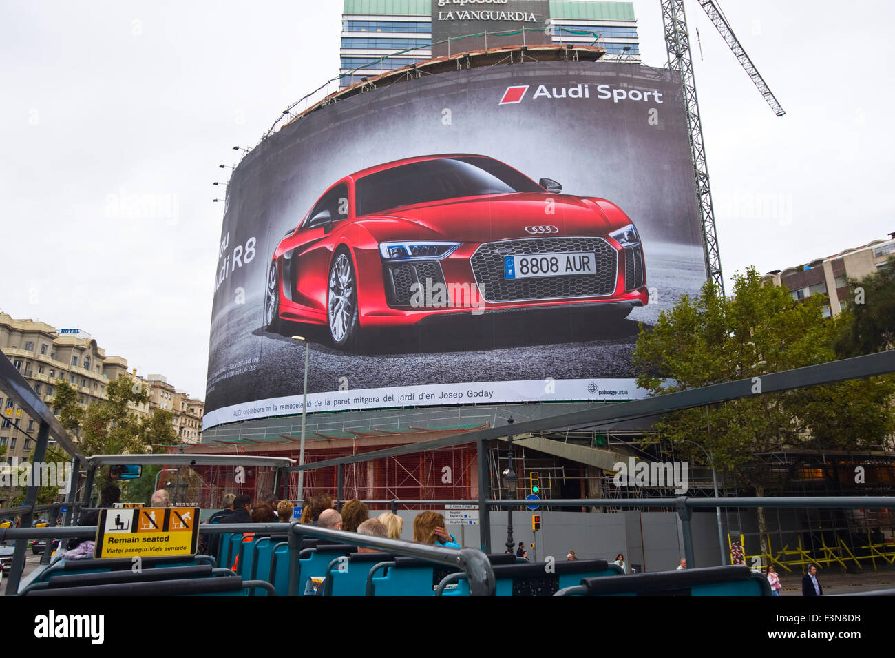 Giant billboard on front of building advertising Audi R8 motorcar in Barcelona Catalonia Spain ES Stock Photo