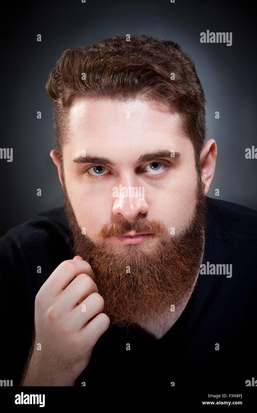 Portrait of a Teenage Hipster with Beard Stock Photo
