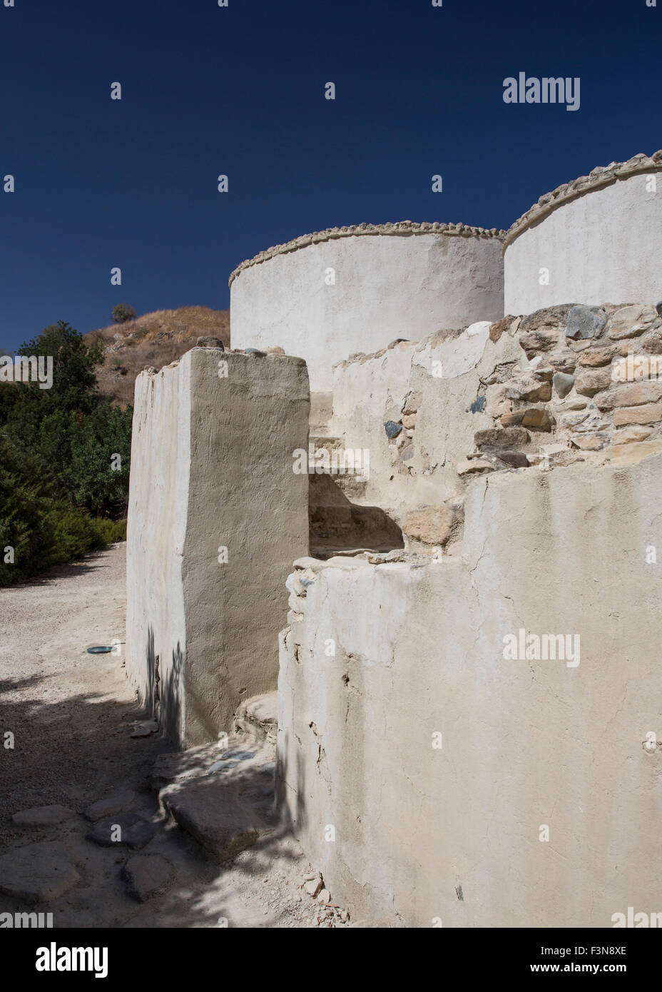 Reconstruction of the protected entrance and houses at the  Neolithic settlement of Choirokoitia in Cyprus Stock Photo