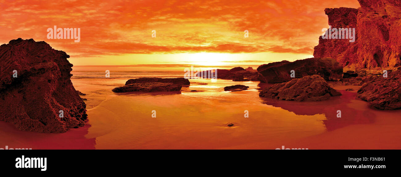 Portugal, Algarve: Romantic beach panorama at sunset Stock Photo