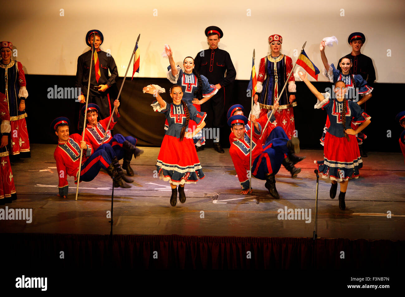 Russian Kozak (cossack) folk dancers group, perform live in 'MAROYLA' cinema theatre. Myrina, Lemnos, Greece. Stock Photo