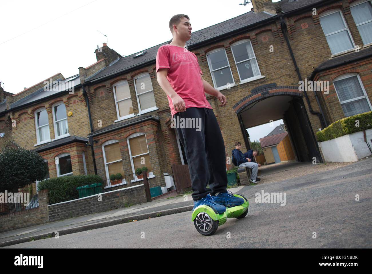 'Hoverboard' scooters being ridden by teenage boys, London, England, UK Stock Photo