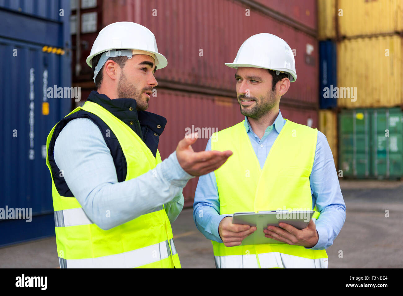 View of a Worker explaining to supervisor security system setting up ...