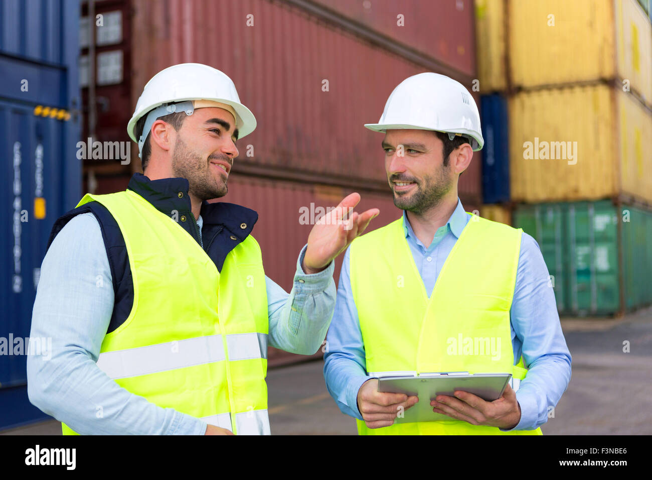 View of a Worker explaining to supervisor security system setting up ...