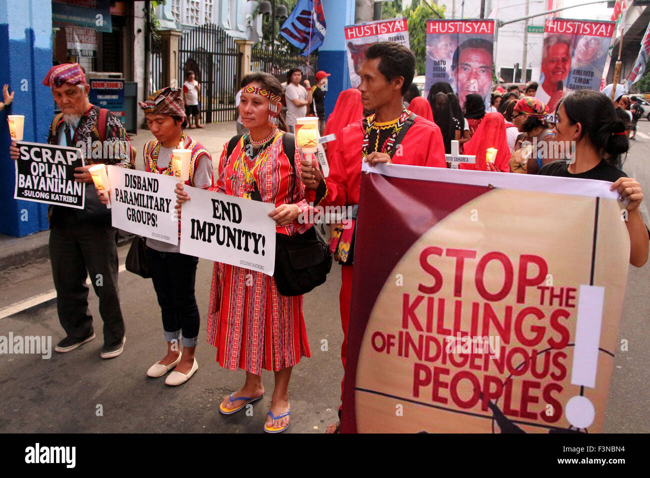 In remembering the 40th day of Lianga, Surigao Del Sur Massacre of Lumads various groups lead by KATRIBU, march to Mendiola wearing red and black veils and carrying torches and candles, calling for justice and to end the cultural impunity under the so-called 'righteous path' and counter -insurgency Oplan Bayanihan of the Pres. Aquino regime. The United Nation's Rapporteur on Internally Displaced Persons, Dr. Chaloka Beyani visited the displaced lumad peoples in Haran Center in Davao City where he expressed concerned over militarization of lumads communities that resulted to human right viola Stock Photo