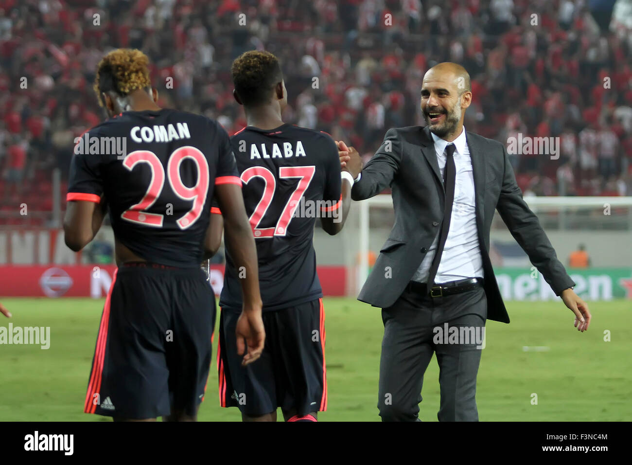 Athens, Greece- September 16, 2015: Coach Josep Guardiola celebrates with the players of Bayern Munchen during the UEFA Champion Stock Photo
