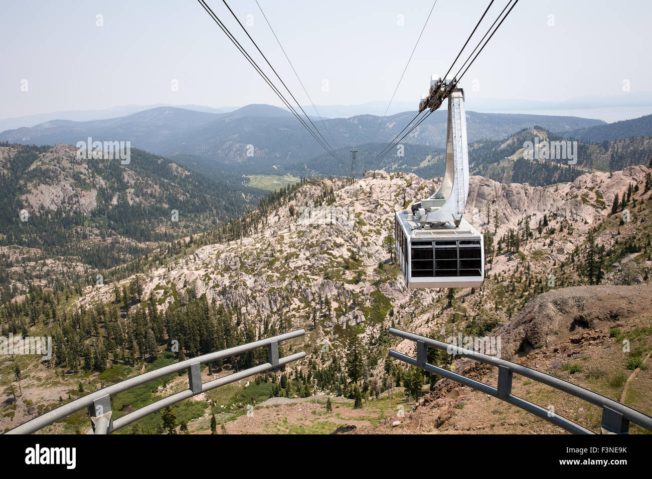 Dramatic view of a hanging gondola. The tram is approaching the