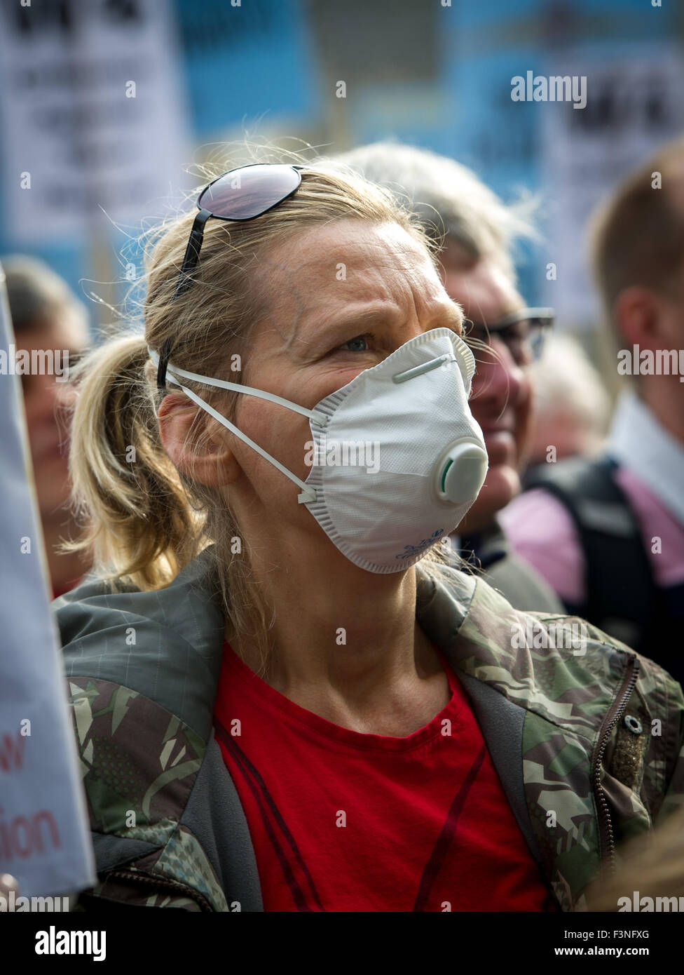 London, UK. 10 October, 2015. An activist wearing an antipollution