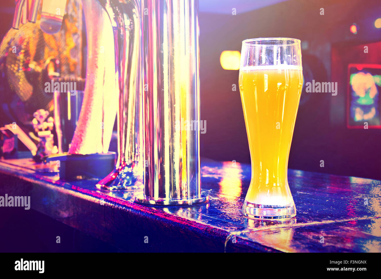 Beer from dispenser. Alcohol conceptual image. Pub. Stock Photo