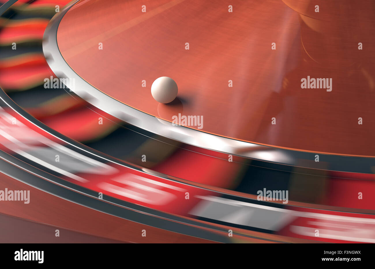 Playing roulette in the casino. Motion blur on the wheel. Stock Photo