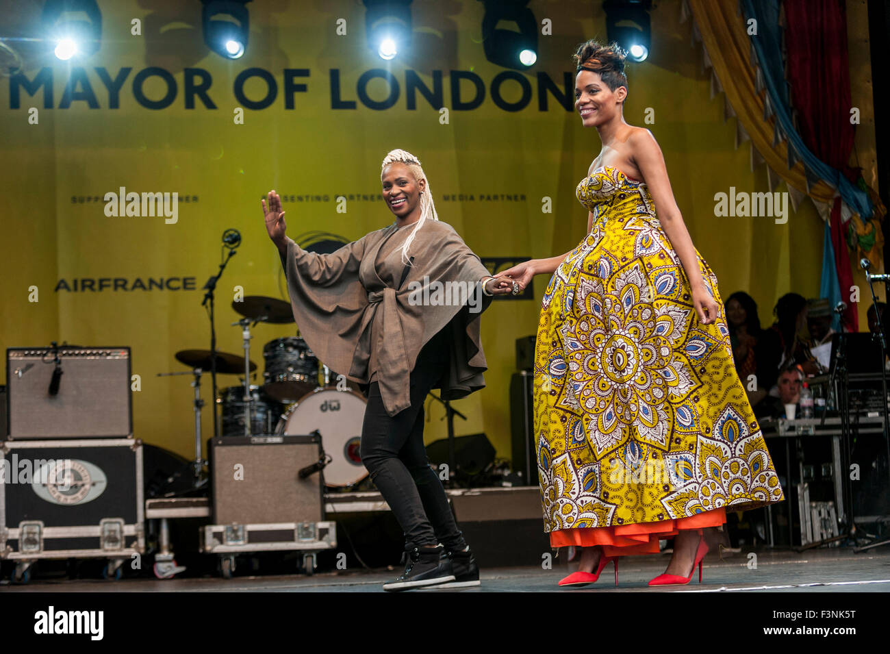London, UK.  10 October 2015.  A model and the up and coming designer Unique Sibanda during 'Africa on the Square', a festival of African culture.  The event is organised by the Mayor of London for Black History Month 2015. Credit:  Stephen Chung / Alamy Live News Stock Photo