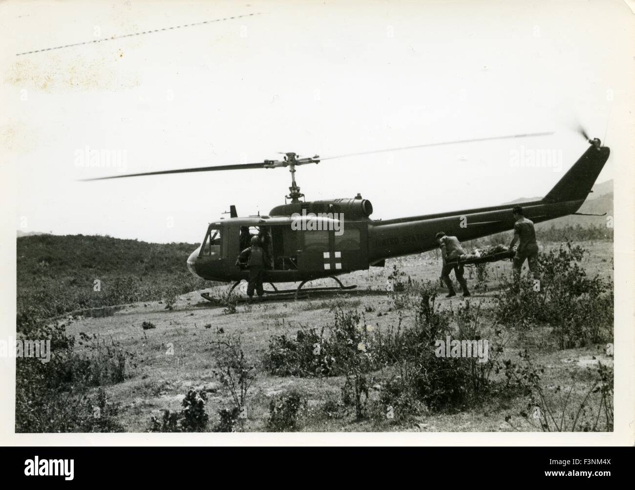 Wounded soldiers are loaded into a United States Army medevac dustoff ...