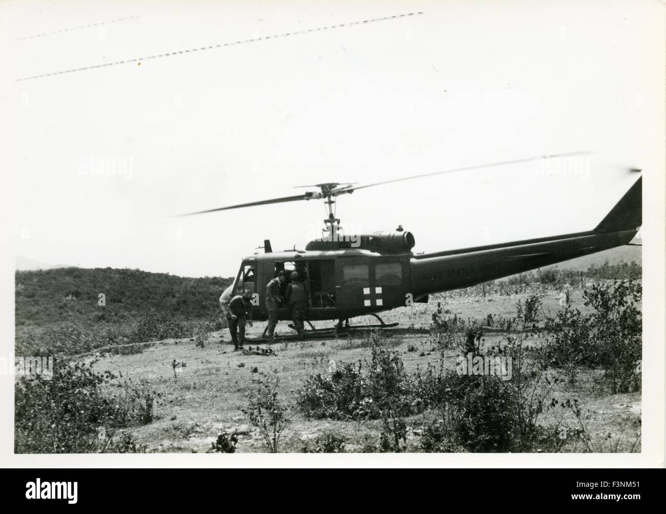 Wounded soldiers are loaded into a United States Army medevac dustoff ...