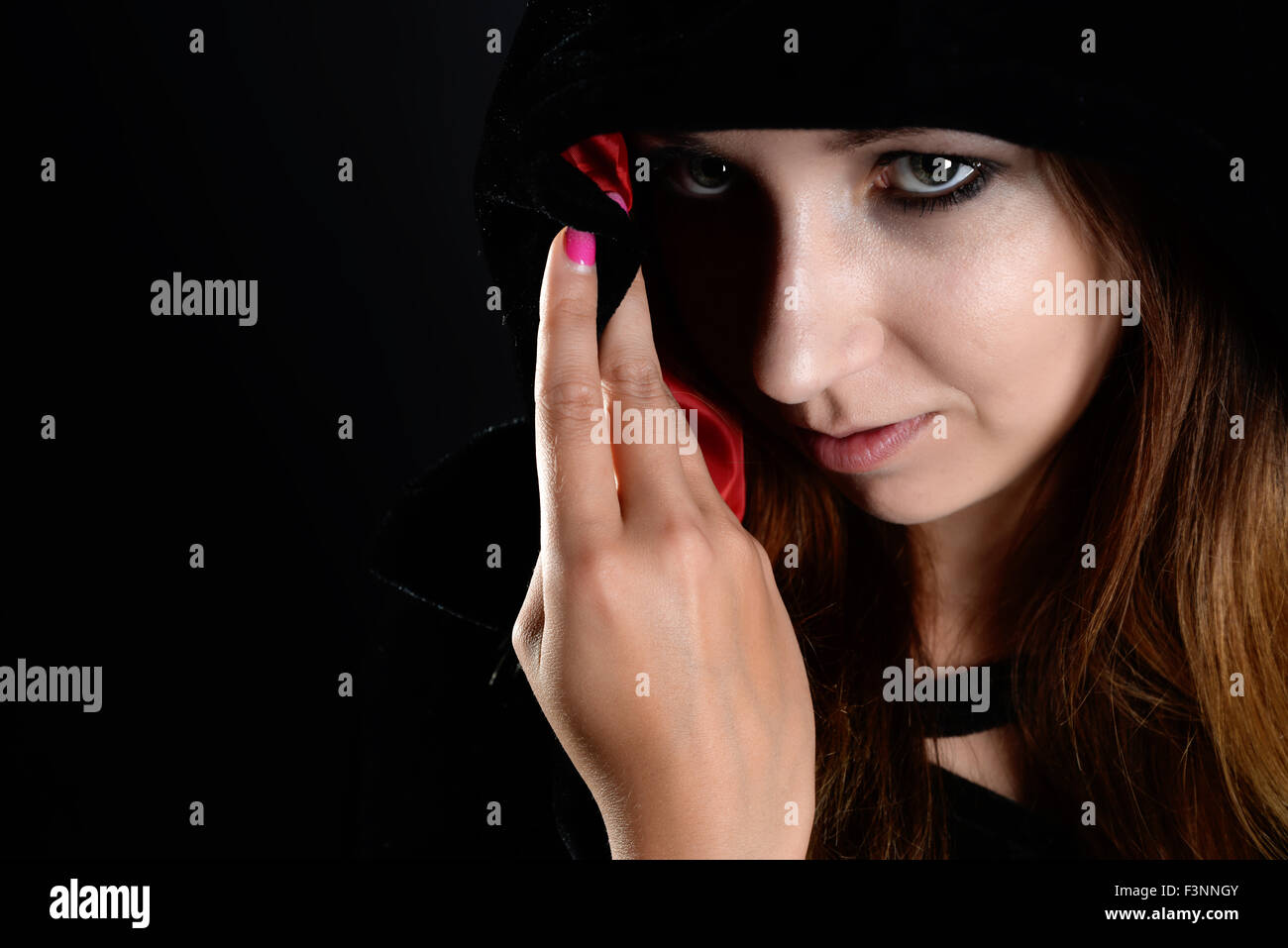 Black cloak with hood hi-res stock photography and images - Alamy