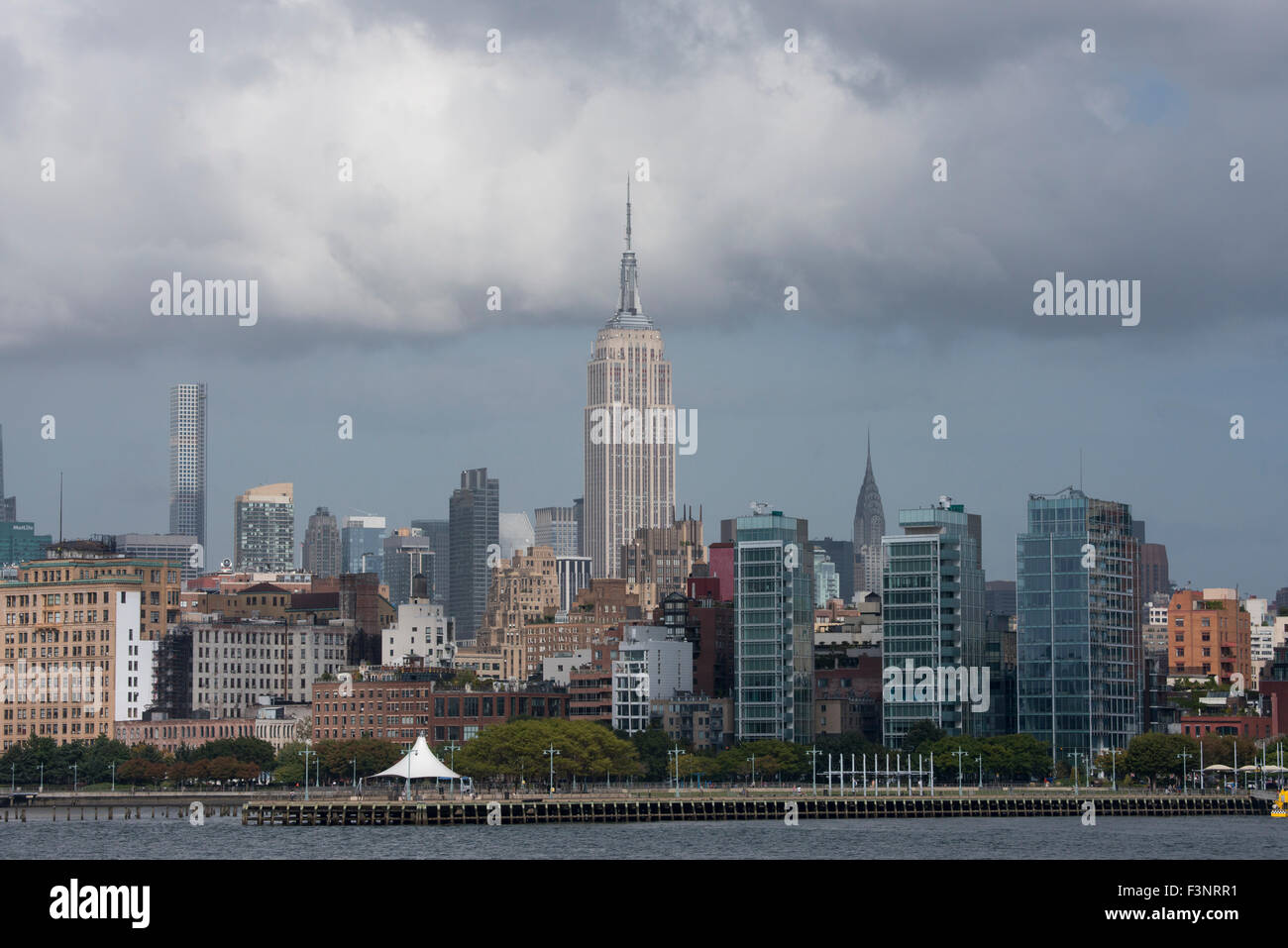 New York, New York City. Hudson River view of Battery Park and Empire State Building city skyline. Stock Photo