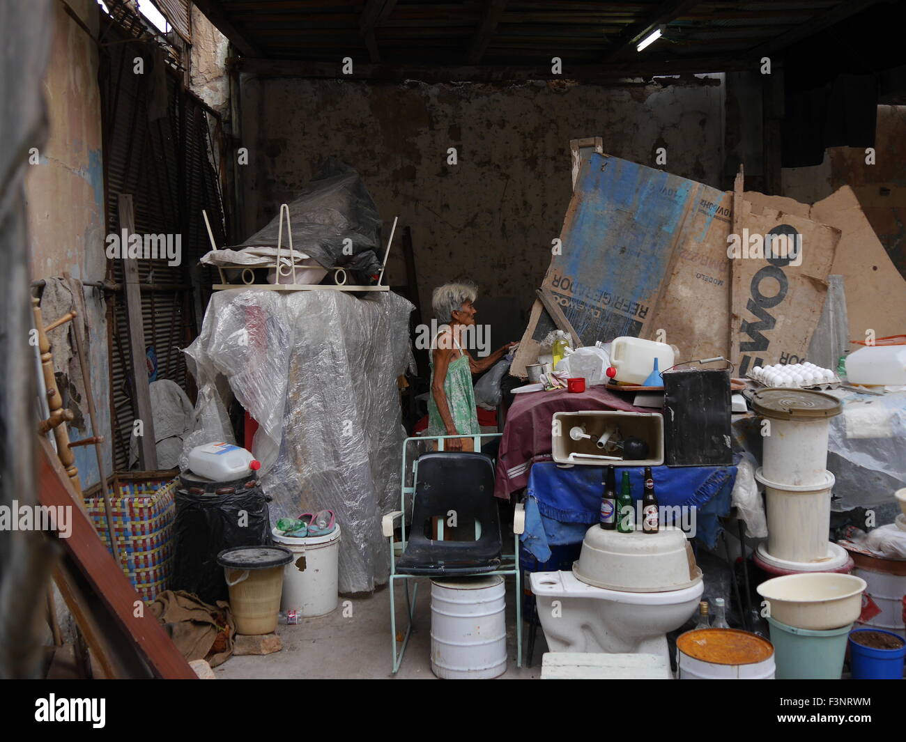 Woman living in a parking, because her house collapsed in Havana Vieja Stock Photo