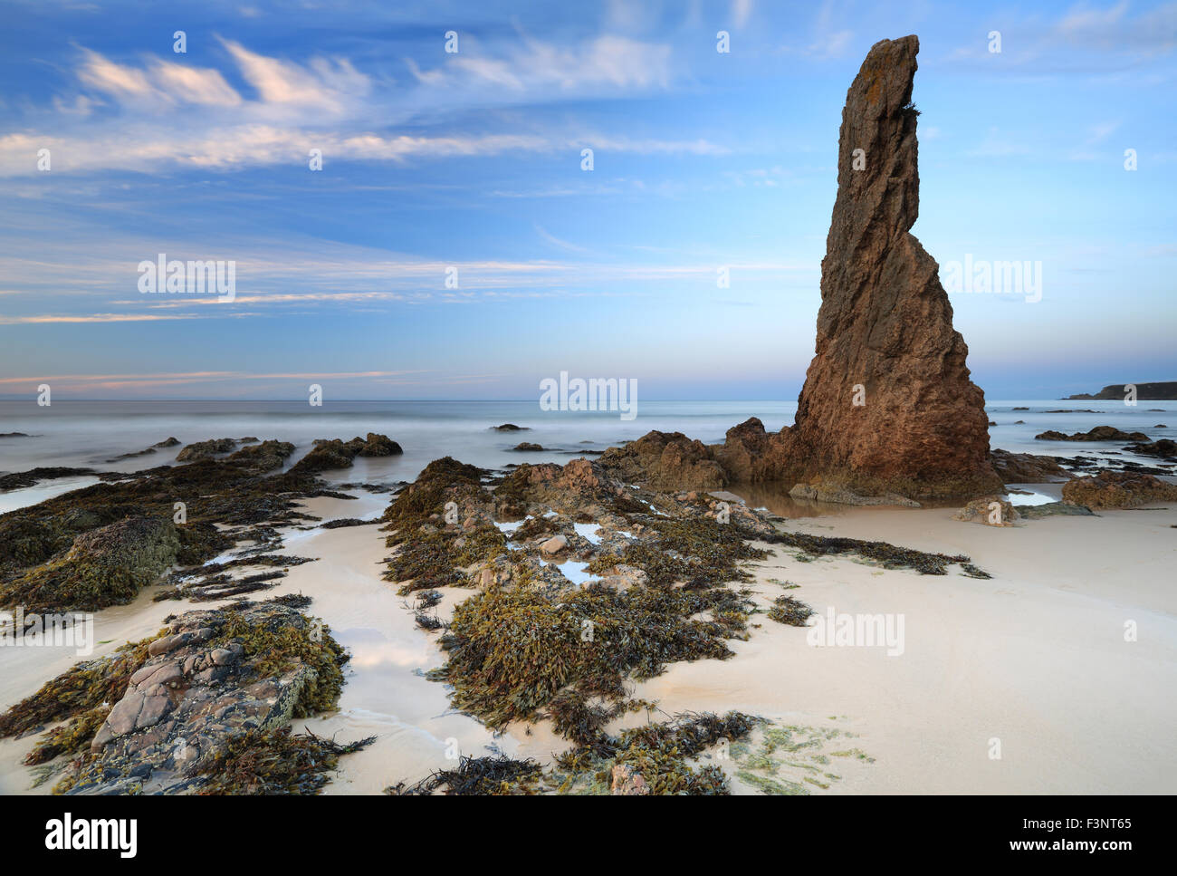 Cullen Bay stack on the beach just before Sunset Stock Photo