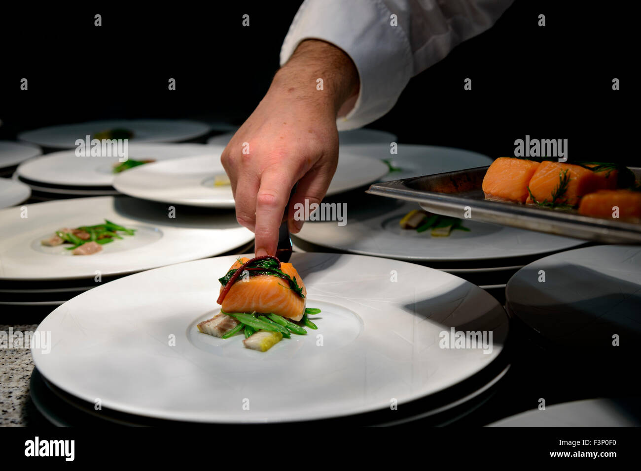 Chef plating gourmet food Stock Photo