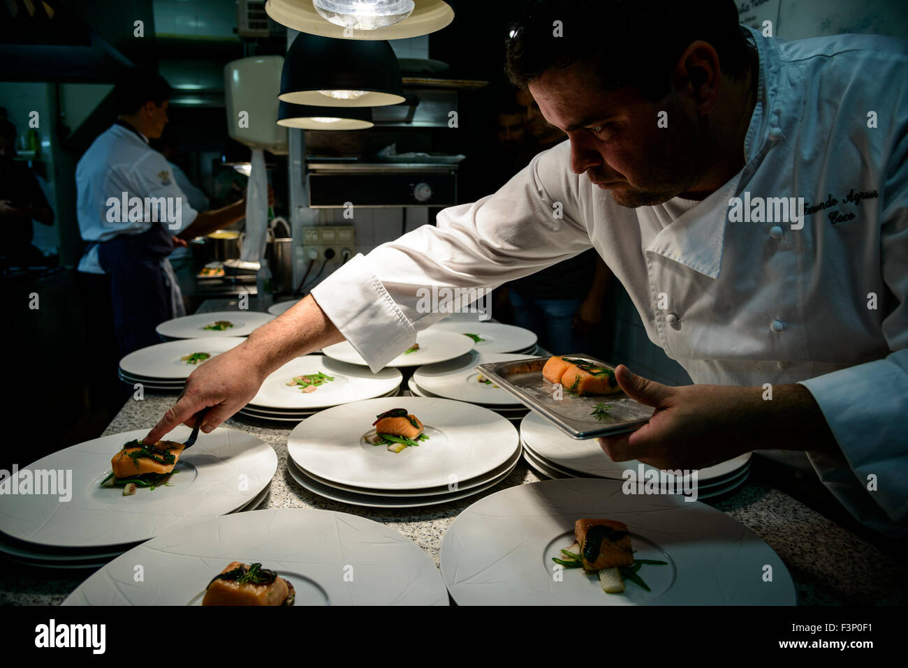 Spanish chef Fernando Agrasar plating gourmet food Stock Photo Alamy
