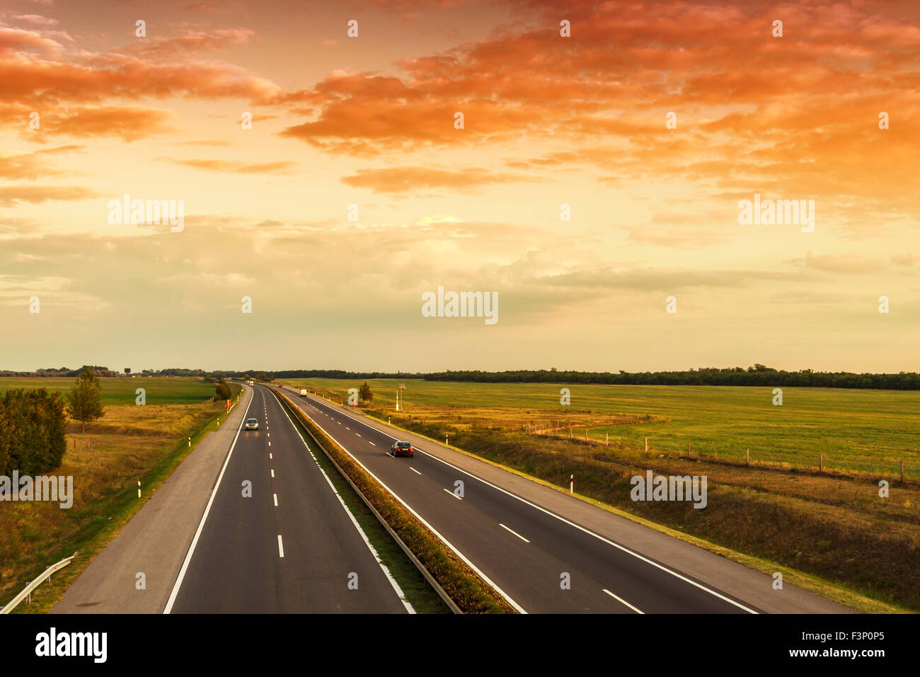 Cars speeding on a highway, Hungary Stock Photo