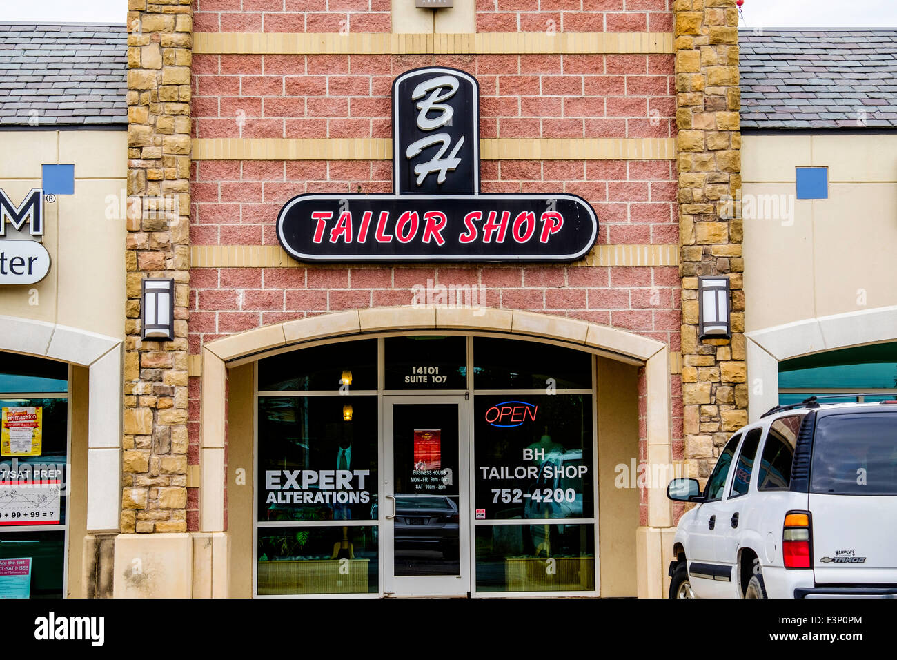 BH Tailor Shop in a strip mall in Oklahoma City, Oklahoma, USA. Stock Photo