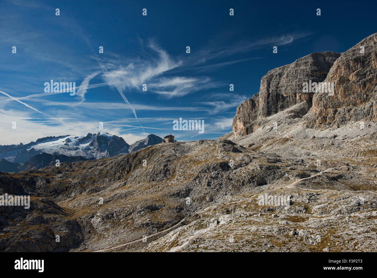 View of Marmolada, Italy's highest peak, and the Franz Kostner Hut in the Dolomites Stock Photo
