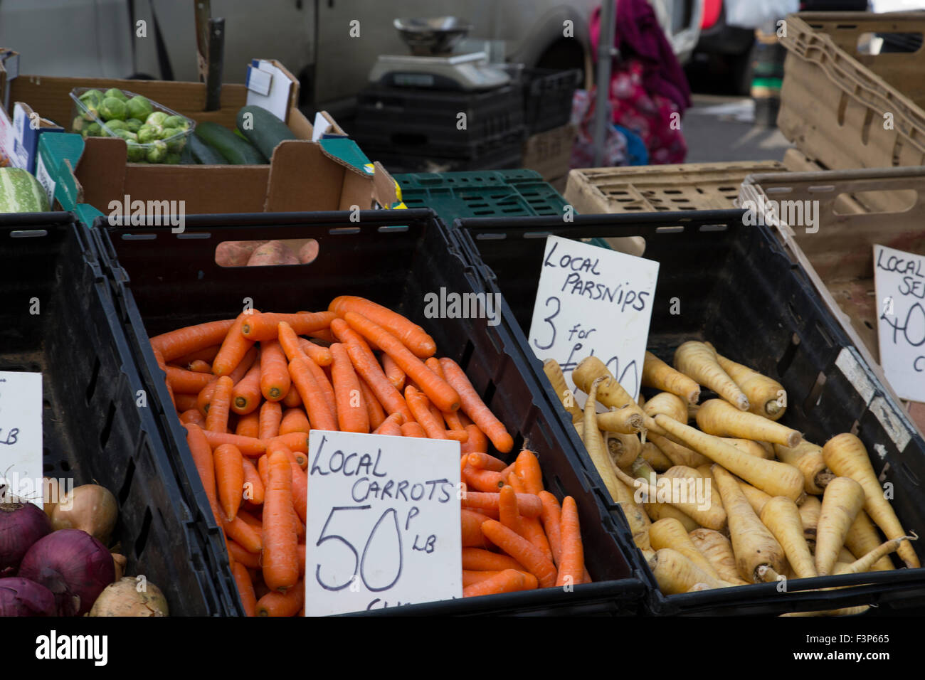 Local market stall selling vegetables Stock Photo