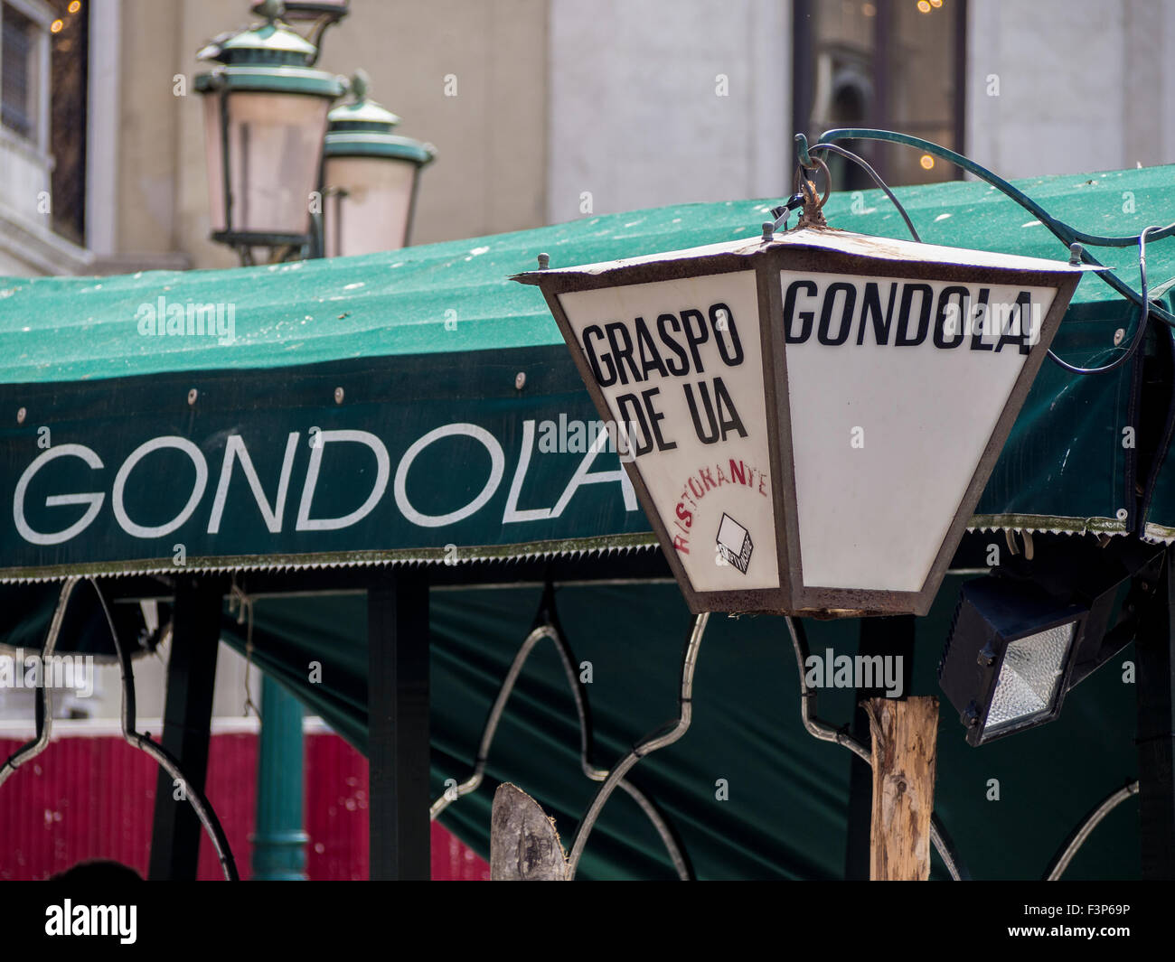 VENICE, ITALY - MAY 05, 2015:  Sign for Hotel Al Gaspo De Ua with vintage lamp Stock Photo
