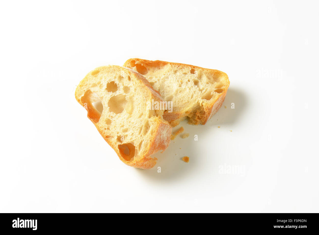 two slices of white bread on white background Stock Photo - Alamy