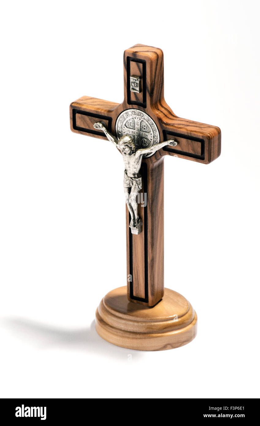 Crucified Christ on a natural wood cross Stock Photo