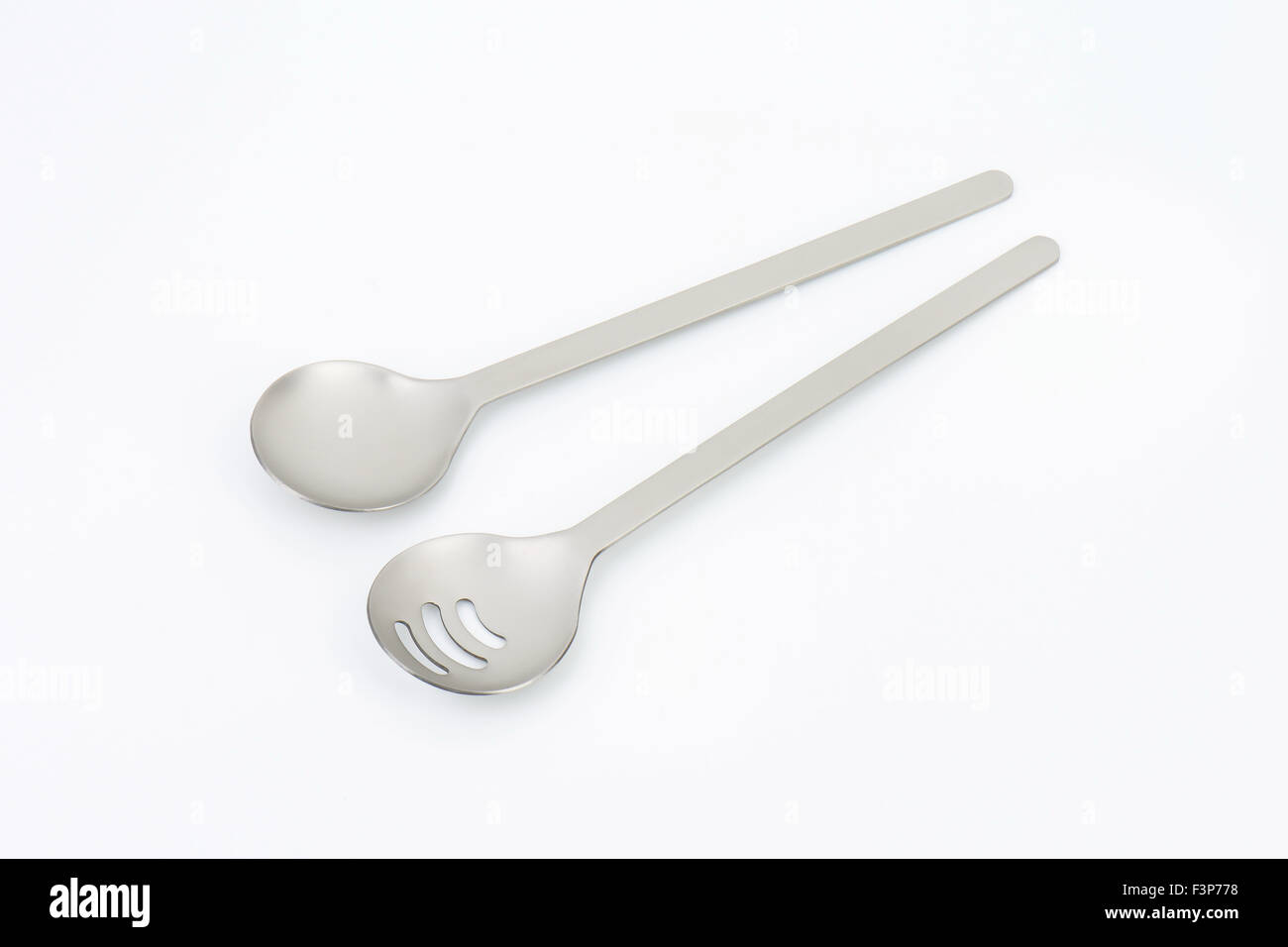 salad servers on white background Stock Photo - Alamy