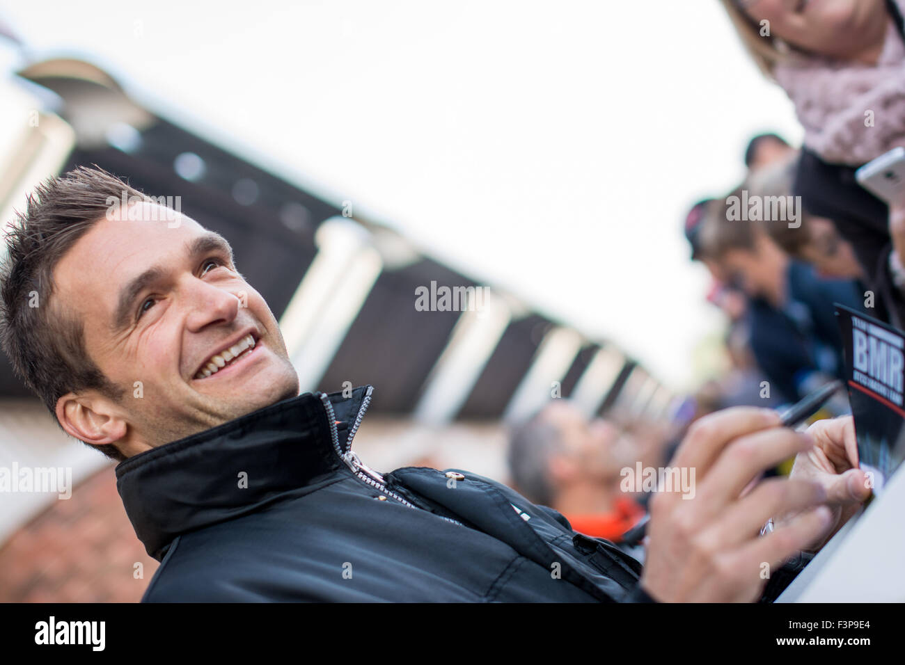 Fawkham, Kent, UK. 11th Oct, 2015. Colin Turkington and Team BMR with fans during Autograph Session of the Dunlop MSA British Touring Car Championship at Brands Hatch GP Circuit on October 11, 2015 in Fawkham, Kent, United Kingdom. Credit:  Gergo Toth/Alamy Live News Stock Photo
