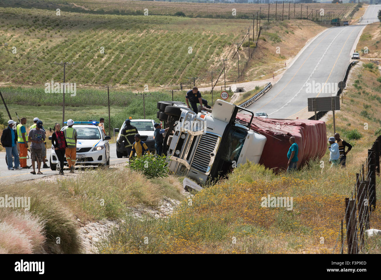 A haulage truck overturned lying in a ditch alongside the Cape Namibian ...