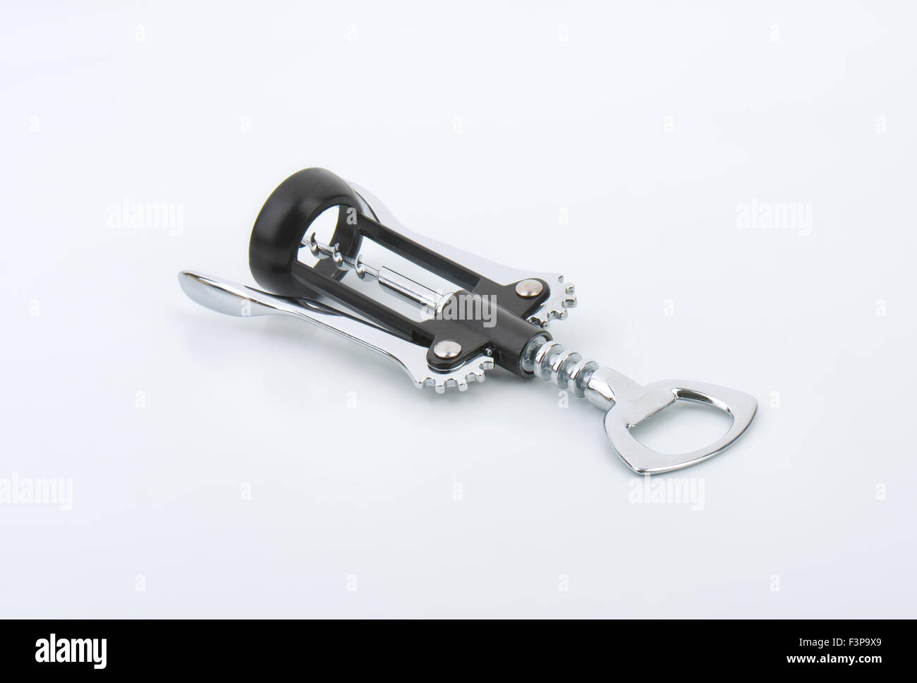 metal bottle opener on white background Stock Photo