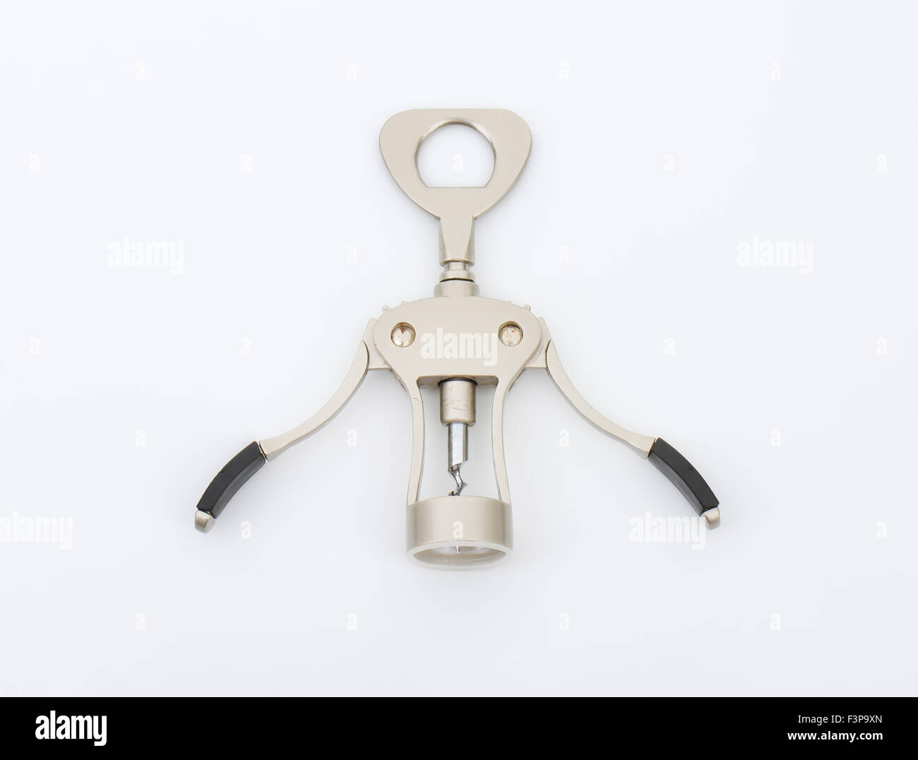 metal bottle opener on white background Stock Photo - Alamy
