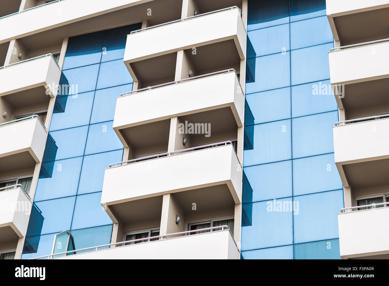 Facade of a building with windows and balconies Stock Photo - Alamy