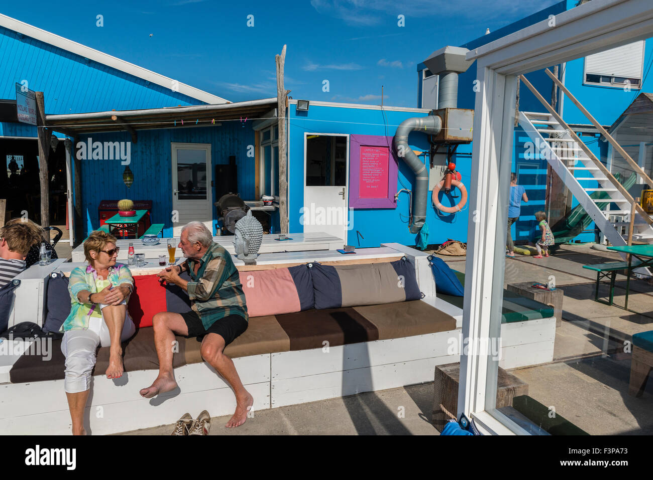 2 July, 2014 The Zandzee Bar at paal 11 at the Noordzee Beach is a colorful place with good food and drinks. The beach is very Stock Photo