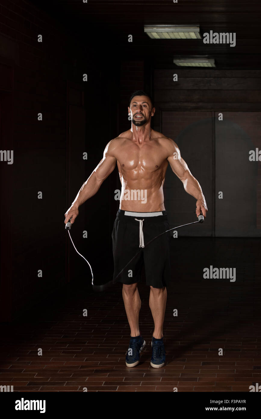 Handsome Muscular Man Exercising Jumping Rope Cardio Time Stock Images, Photos, Reviews