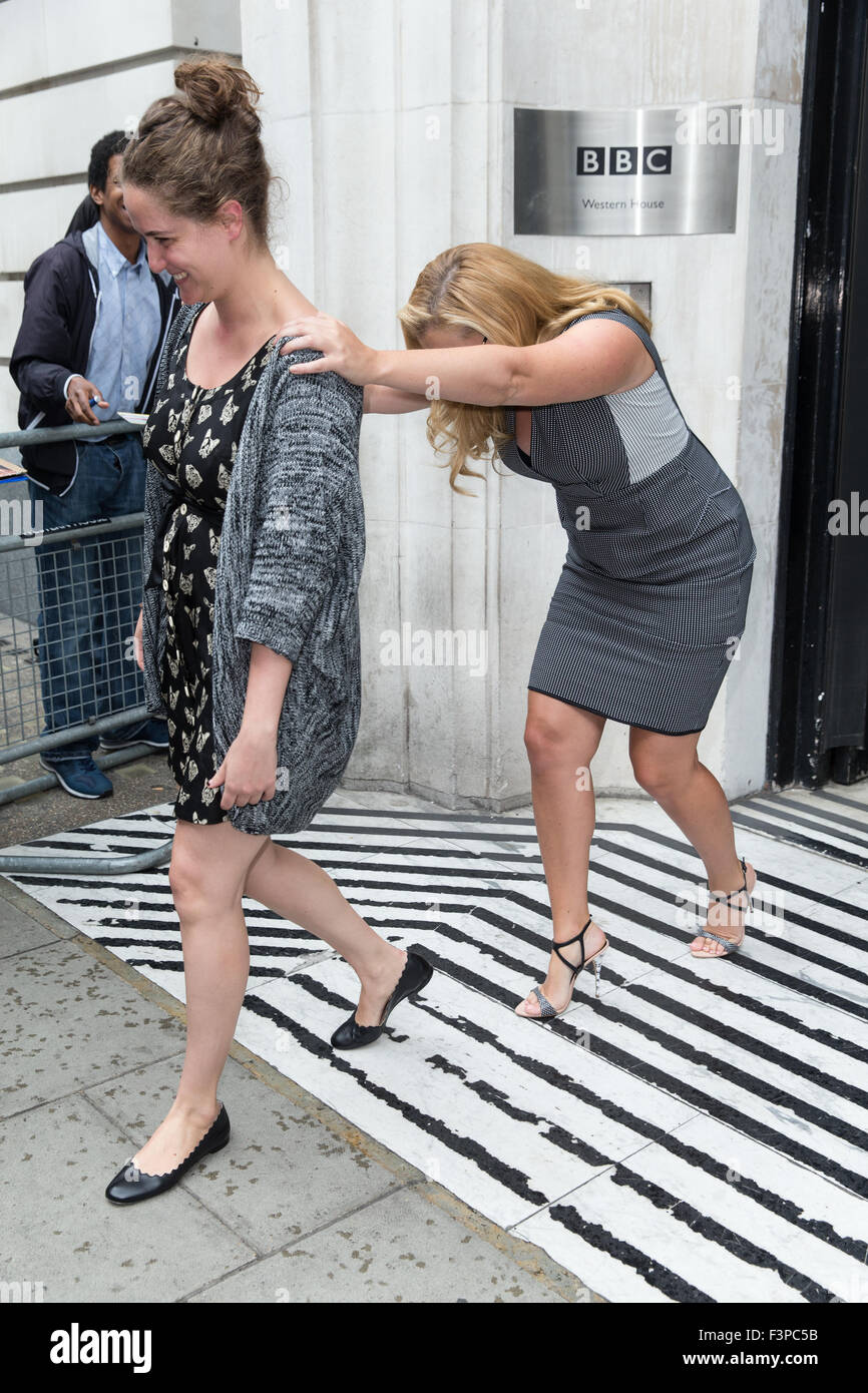 Amy Schumer pictured leaving the Radio 2 studios avoiding the press photographers  Featuring: Amy Schumer, Kimberly Schumer Where: London, United Kingdom When: 10 Aug 2015 Stock Photo