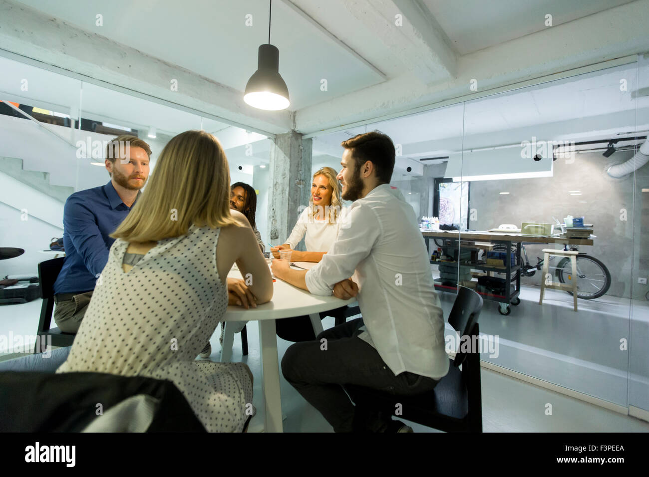 Young people in the office Stock Photo - Alamy