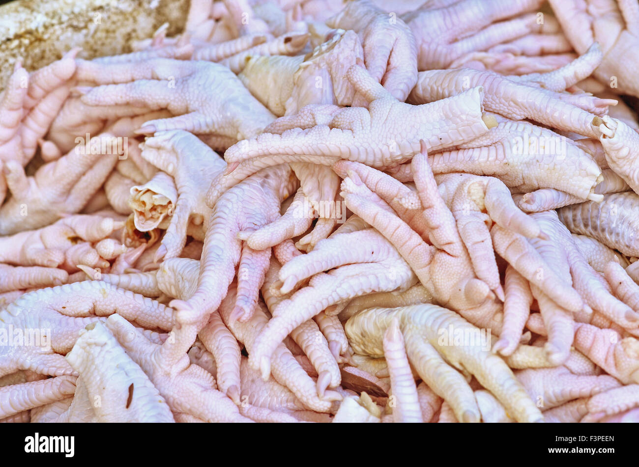 Chicken feet sell in market Stock Photo Alamy
