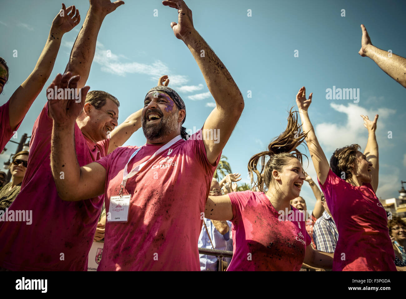 Sitges, Catalonia, Spain. 11th Oct, 2015. The winning team of the 2015 grape stomp competition in Sitges celebrate their victory © Matthias Oesterle/ZUMA Wire/Alamy Live News Stock Photo