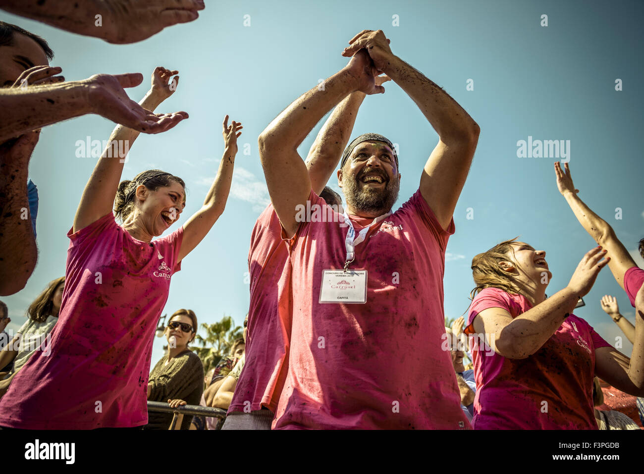 Sitges, Catalonia, Spain. 11th Oct, 2015. The winning team of the 2015 grape stomp competition in Sitges celebrate their victory © Matthias Oesterle/ZUMA Wire/Alamy Live News Stock Photo