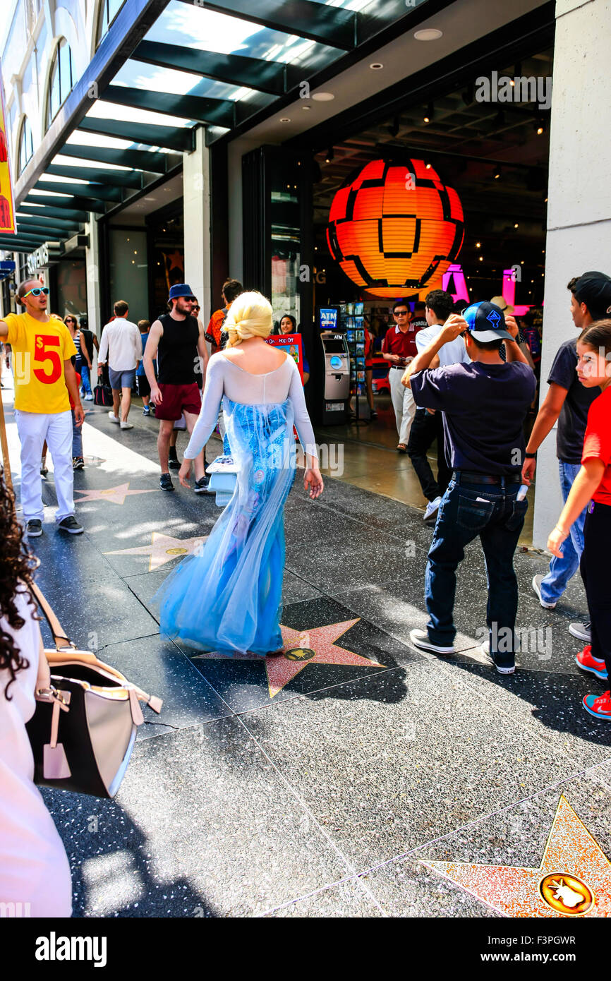 People walking along the Walk of Fame on Hollywood Blvd in Los Angeles ...