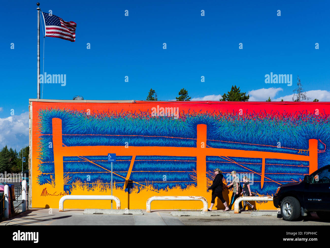 Colorful exterior wall mural by Artist David Klaren; US Post Office; Pinedale; Wyoming; USA Stock Photo
